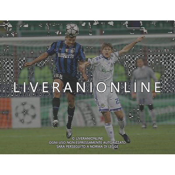 Milano 2-10-2009 Champions League 2009/10 Inter-Dianamo Kiev 2:2 nella foto lucio e artem kravets ph marco luzzani/ag aldo liverani s.a.s.