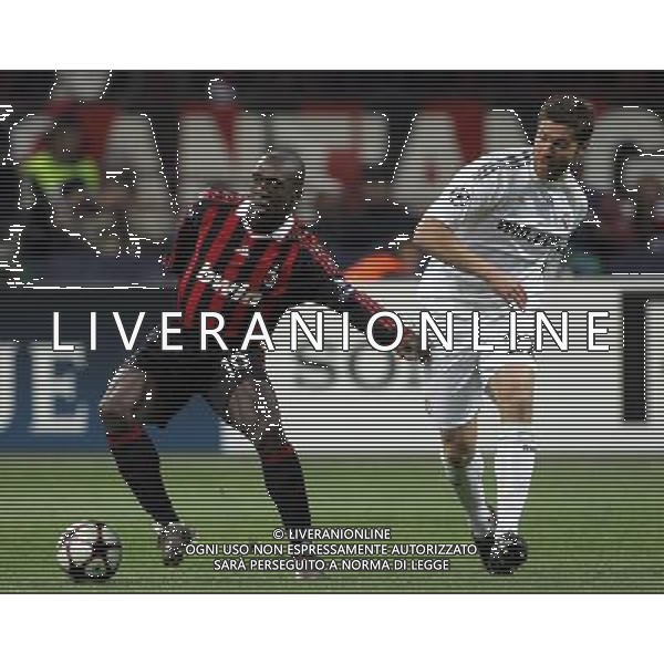 Milan - Real Madrid Campions League 03/11/2009 nella foto clarence seedorf e xabi alonso ©Luzzani/Agenzia Aldo Liverani Sas