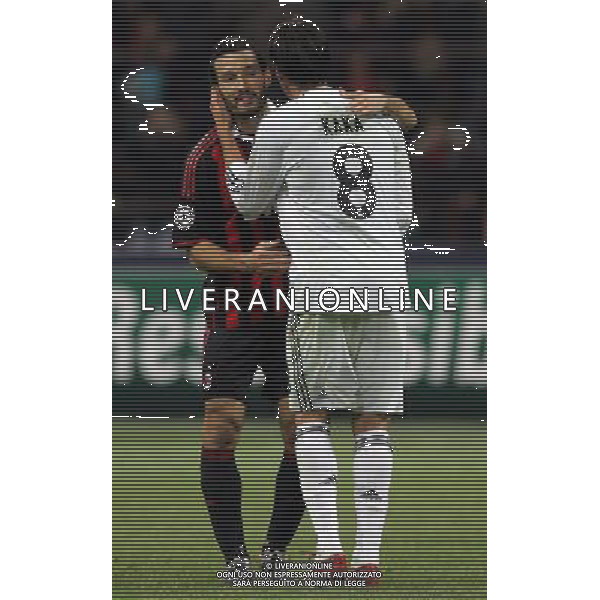 Milan - Real Madrid Champions League 03/11/2009 nella foto abbraccio tra ricardo kaka\' e gianluca zambrotta a fine gara ©Luzzani/Agenzia Aldo Liverani Sas
