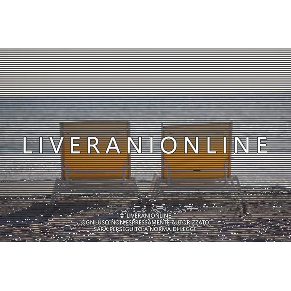 Deckchairs and sunloungers on the beach in front of the sea at South Beach on Miami Beach, America /Agenzia Aldo Liverani Sas - ITALY ONLY -