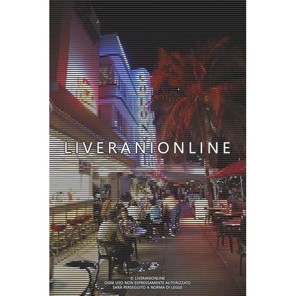 Night scene of the blue lights of the Colony Hotel and street cafe in the art deco district on Ocean Drive on Miami Beach, America /Agenzia Aldo Liverani Sas - ITALY ONLY -