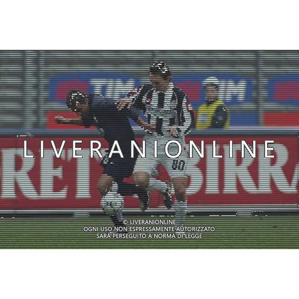 JUVENTUS - SIENA 18/12/2003 COPPA ITALIA TIM CUP NELLA FOTO : ANTONIO CONTE E SIMONE BONOMI* FOTO: FILIPPO VENEZIA / AG : ALDO LIVERANI