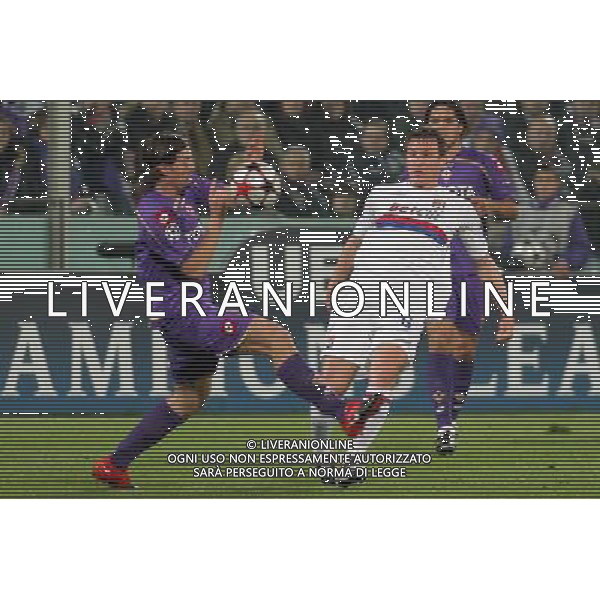 FIORENTINA - OLYMPIQUE LIONE CHAMPIONS LEAGUE 2009/2010 FIRENZE 24/11/2009 NELLA FOTO: KIM KALLSTROM E RICCARDO MONTOLIVO ©AGENZIA ALDO LIVERANI S.A.S.
