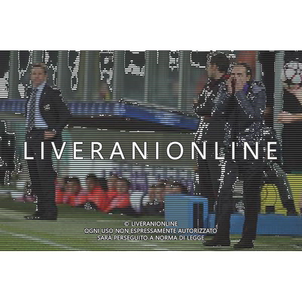 FIORENTINA - OLYMPIQUE LIONE CHAMPIONS LEAGUE 2009/2010 FIRENZE 24/11/2009 NELLA FOTO: CESARE PRANDELLI ALLENATORE DELLA FIORENTINA E CLAUDE PUEL ALLENATORE DEL LIONE ©AGENZIA ALDO LIVERANI S.A.S.