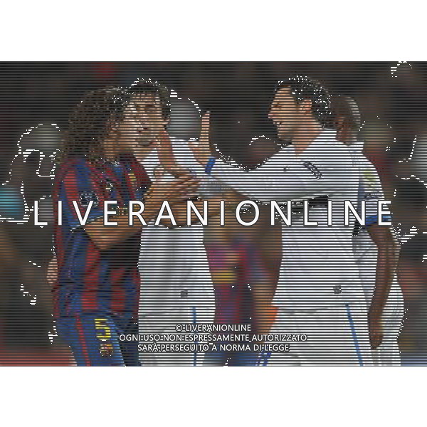 Champions League 2009/2010 Gruppo F MD5 Barcellona - 24.11.2009 FC Barcellona-FC Inter Nella Foto:BATTIBECCO A FINE PRIMO TEMPO FRA THIAGO MOTTA E PUYOL /Ph.Vitez-Ag. Aldo Liverani