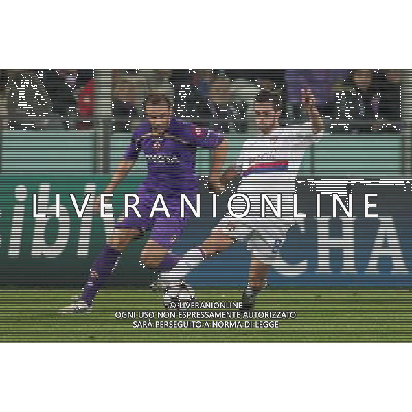 FIORENTINA - OLYMPIQUE LIONE CHAMPIONS LEAGUE 2009/2010 FIRENZE 24/11/2009 NELLA FOTO: MIRALEM PJANIC E CRISTIANO ZANETTI ©AGENZIA ALDO LIVERANI S.A.S.