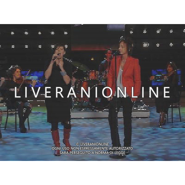 ROMA - STUDI DELLA DEAR 06/12/2009 TRASMISSIONE TELEVISIVA \'DOMENICA IN\' nella foto: GIANNA NANNINI SI ESIBISCE CON GIORGIA ©BRUNI/AGENZIA ALDO LIVERANI SAS