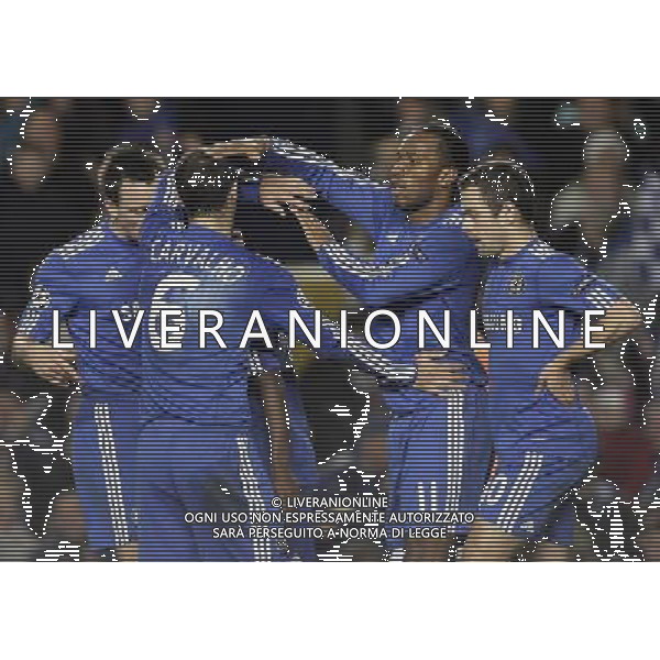 Chelsea«s Didier Drogba (second right) celebrates with his team mates his goal against Apoel during the Champions League group stage game between Chelsea FC and Apoel FC in Stamford Bridge Stadium, London, Britain, 8 December 2009. /AGENZIA ALDO LIVERANI SAS - ITALY ONLY -
