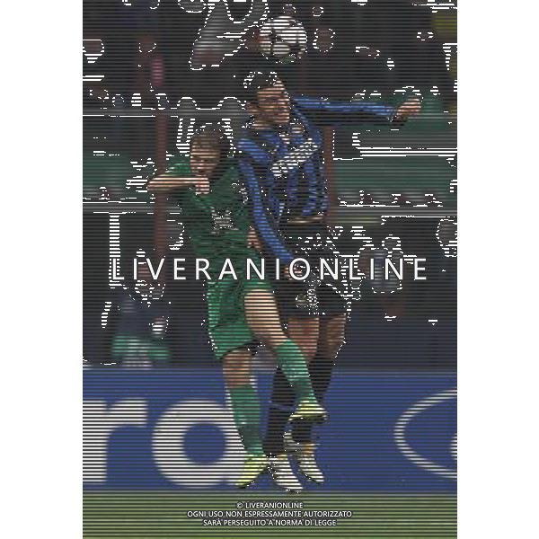 Champions League 2009/2010 Gruppo F MD6 Milano - 09.12.2009 FC Inter-FC Rubin Kazan Nella Foto: gokdeniz karadeniz e lucio ©luzzani-Ag. Aldo Liverani