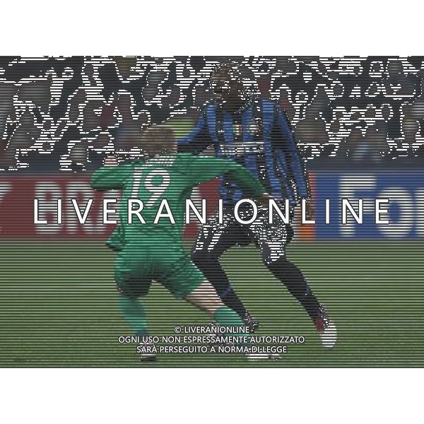 Milano 09-12-2009 Champions League 2009/10 inter-rubin kazan 2:0 nella foto mario balotelli e vitali kaleshin ph marco luzzani/ag aldo liverani s.a.s.