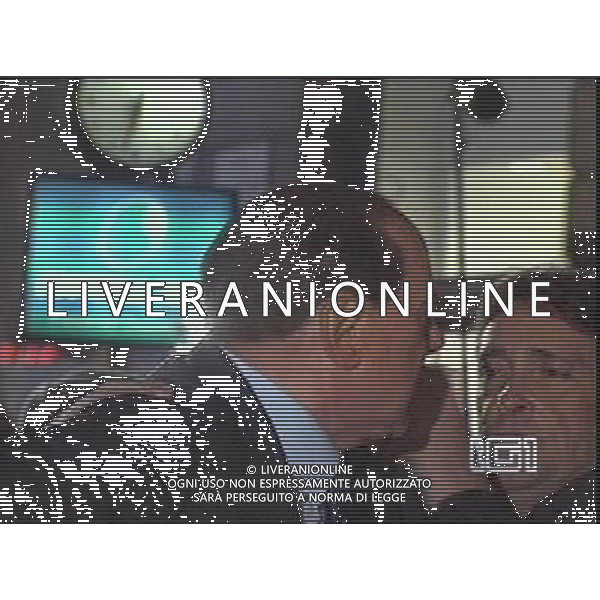 Aggressione al Presidente del Consiglio Silvio Berlusconi alla fine del suo comizio in Piazza Duomo a Milano 13/12/2009 nella foto Silvio Berlusconi viene soccorso dopo essere stato colpito obbligatorio citare la fonte televisiva (Tg1) Agenzia Aldo Liverani Sas 