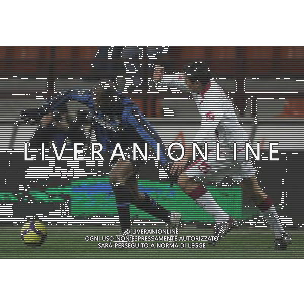 Inter - Livorno Coppa Italia Tim Cup 16/12/2009 nella foto david suazo e perticone ©Luzzani/Agenzia Aldo Liverani Sas