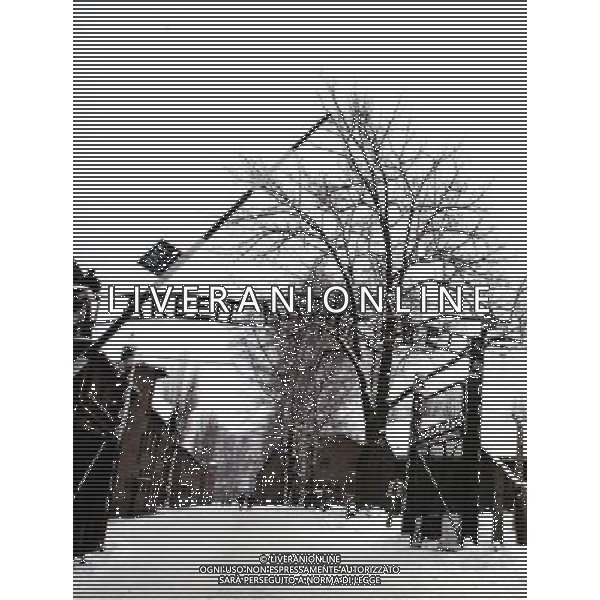 A survivor of Auschwitz walks past the famous entrance with the words \' Arbeit macht Frei\'. At the site, preparations are underway for a large commemoration on Thursday 27th January that marks the 60th anniversary of the liberation of Auschwitz. Date: 25.01.2005. Ref: B04_086877_0001 COMPULSORY CREDIT: UPPA/Photoshot/AG ALDO LIVERANI SAS *** Local Caption *** ITALY ONLY