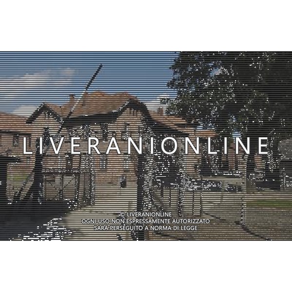Poland, Lesser Poland (Malopolskie region), Cracow area (Oswiecim village), Auschwitz concentration camp, the camp entry with maxim Arbeit macht frei (work makes free) Ref: WP_EH104463 Compulsory Credit: World Pictures/Photoshot/AG ALDO LIVERANI SAS *** Local Caption *** ITALY ONLY