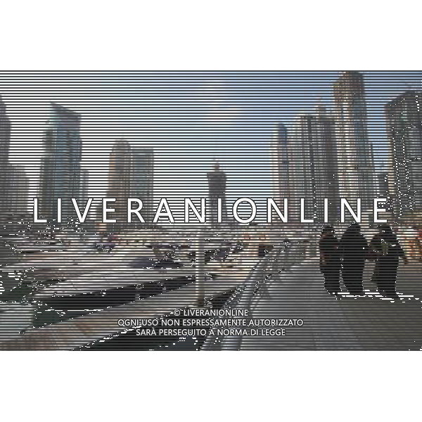 Emirati women stroll at Dubai Marina Walk in Dubai, November 30, 2009. /Agenzia Aldo Liverani Sas - ITALY ONLY -
