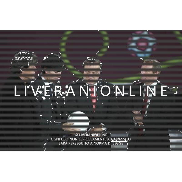 Austria coach Dietmar Constantini (L), German coach Joachim Loew (C) and Belgian Coach Dick Advocaat (2R) and Azerbaijan coach Hans-Hubert \'Berti\' Vogts (R) after the UEFA EURO 2012 qualifying Draw Cremony in the Congress Hall of the Palace of Culture and Science in Warsaw, Poland, 7 February 2010. /Agenzia Aldo Liverani Sas - ITALY ONLY - VARSAVIA: SORTEGGI DI QUALIFICAZIONE AGLI EUROPEI DI CALCIO UCRAINA-POLONIA 2012