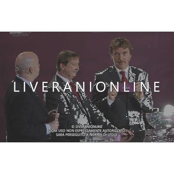 Polish former football star Zbigniew Boniek (R) draws Spain next UEFA general secretary Gianni Infantino (L) and Polish former football star Andrzej Szarmach (C) durnig the UEFA EURO 2012 qualifying Draw Cremony in the Congress Hall of the Palace of Culture and Science in Warsaw, Poland, 7 February 2010. 51 teams taking part in the Euro 2012 qualifications will create nine groups. Six of them will consist of six teams, and three of them – five. Winners and one team from the second place with the best achievements will advance to championships directly. The other eight teams classified on the second position in the group will set up four pairs. The EURO 2012 European soccer championship will kick off June 2012 in Poland and Ukraine. The opening match at the National Stadium in Warsaw will take place on 8 June. Eliminations will begin in September 2010 and will last until autumn 2011. /Agenzia Aldo Liverani Sas - ITALY ONLY - VARSAVIA: SORTEGGI DI QUALIFICAZIONE AGLI EUROPEI DI CALCIO UCRAINA-POLONIA 2012