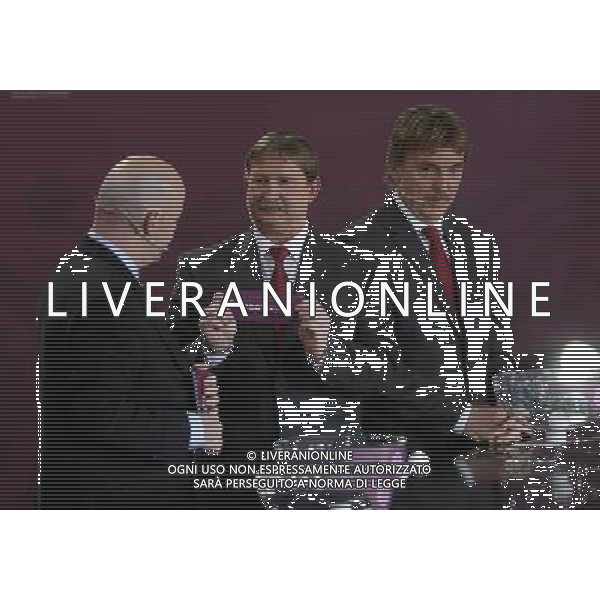 Polish former football star Andrzej Szarmach (C) draws Portugal next UEFA general secretary Gianni Infantino (L) and Polish former football star Zbigniew Boniek durnig the UEFA EURO 2012 qualifying Draw Cremony in the Congress Hall of the Palace of Culture and Science in Warsaw, Poland, 7 February 2010. 51 teams taking part in the Euro 2012 qualifications will create nine groups. Six of them will consist of six teams, and three of them – five. Winners and one team from the second place with the best achievements will advance to championships directly. The other eight teams classified on the second position in the group will set up four pairs. The EURO 2012 European soccer championship will kick off June 2012 in Poland and Ukraine. The opening match at the National Stadium in Warsaw will take place on 8 June. Eliminations will begin in September 2010 and will last until autumn 2011. /Agenzia Aldo Liverani Sas - ITALY ONLY - VARSAVIA: SORTEGGI DI QUALIFICAZIONE AGLI EUROPEI DI CALCIO UCRAINA-POLONIA 2012