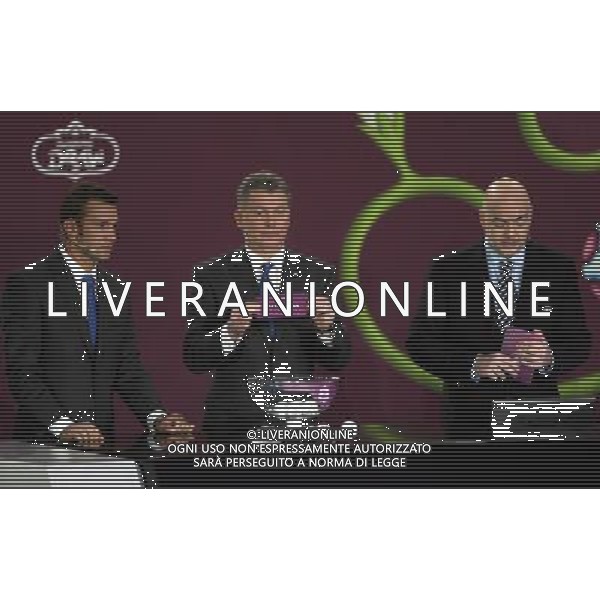 Ukrainian former football star Oleg Blokhin (C) draws Slovakia next the Ukrainian soccer player Andriy Shevchenko (L) with UEFA general secretary Gianni Infantino (R) durnig the UEFA EURO 2012 qualifying Draw Cremony in the Congress Hall of the Palace of Culture and Science in Warsaw, Poland, 7 February 2010. 51 teams taking part in the Euro 2012 qualifications will create nine groups. Six of them will consist of six teams, and three of them – five. Winners and one team from the second place with the best achievements will advance to championships directly. The other eight teams classified on the second position in the group will set up four pairs. The EURO 2012 European soccer championship will kick off June 2012 in Poland and Ukraine. The opening match at the National Stadium in Warsaw will take place on 8 June. Eliminations will begin in September 2010 and will last until autumn 2011. /Agenzia Aldo Liverani Sas - ITALY ONLY - VARSAVIA: SORTEGGI DI QUALIFICAZIONE AGLI EUROPEI DI CALCIO UCRAINA-POLONIA 2012