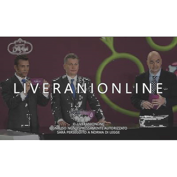 Ukrainian football star Andriy Shevchenko (L) draw Turkey next the former Ukrainian soccer player Oleg Blokhin (C) with UEFA general secretary Gianni Infantino (R) durnig the UEFA EURO 2012 qualifying Draw Cremony in the Congress Hall of the Palace of Culture and Science in Warsaw, Poland, 7 February 2010. 51 teams taking part in the Euro 2012 qualifications will create nine groups. Six of them will consist of six teams, and three of them – five. Winners and one team from the second place with the best achievements will advance to championships directly. The other eight teams classified on the second position in the group will set up four pairs. The EURO 2012 European soccer championship will kick off June 2012 in Poland and Ukraine. The opening match at the National Stadium in Warsaw will take place on 8 June. Eliminations will begin in September 2010 and will last until autumn 2011. /Agenzia Aldo Liverani Sas - ITALY ONLY - VARSAVIA: SORTEGGI DI QUALIFICAZIONE AGLI EUROPEI DI CALCIO UCRAINA-POLONIA 2012
