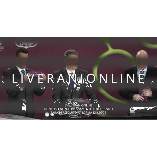 Ukrainian football star Andriy Shevchenko (L) draw Czech Republic next the former Ukrainian soccer player Oleg Blokhin (C) with UEFA general secretary Gianni Infantino (R) durnig the UEFA EURO 2012 qualifying Draw Cremony in the Congress Hall of the Palace of Culture and Science in Warsaw, Poland, 7 February 2010. 51 teams taking part in the Euro 2012 qualifications will create nine groups. Six of them will consist of six teams, and three of them – five. Winners and one team from the second place with the best achievements will advance to championships directly. The other eight teams classified on the second position in the group will set up four pairs. The EURO 2012 European soccer championship will kick off June 2012 in Poland and Ukraine. The opening match at the National Stadium in Warsaw will take place on 8 June. Eliminations will begin in September 2010 and will last until autumn 2011. /Agenzia Aldo Liverani Sas - ITALY ONLY - VARSAVIA: SORTEGGI DI QUALIFICAZIONE AGLI EUROPEI DI CALCIO UCRAINA-POLONIA 2012