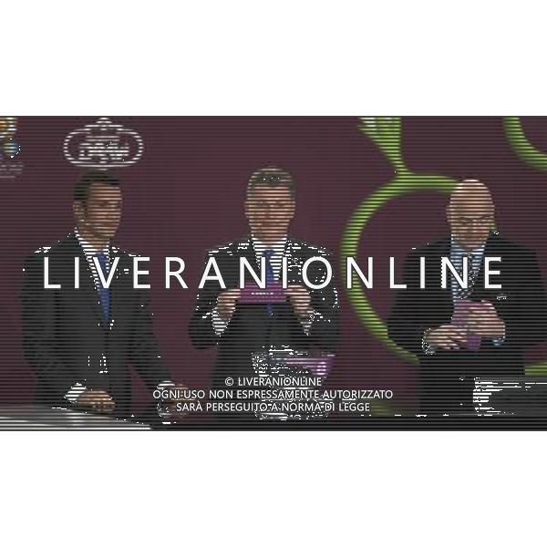 Ukrainian former football star Oleg Blokhin (C) draws Greece next the Ukrainian soccer player Andriy Shevchenko (L) with UEFA general secretary Gianni Infantino (R) durnig the UEFA EURO 2012 qualifying Draw Cremony in the Congress Hall of the Palace of Culture and Science in Warsaw, Poland, 7 February 2010. 51 teams taking part in the Euro 2012 qualifications will create nine groups. Six of them will consist of six teams, and three of them – five. Winners and one team from the second place with the best achievements will advance to championships directly. The other eight teams classified on the second position in the group will set up four pairs. The EURO 2012 European soccer championship will kick off June 2012 in Poland and Ukraine. The opening match at the National Stadium in Warsaw will take place on 8 June. Eliminations will begin in September 2010 and will last until autumn 2011. /Agenzia Aldo Liverani Sas - ITALY ONLY - VARSAVIA: SORTEGGI DI QUALIFICAZIONE AGLI EUROPEI DI CALCIO UCRAINA-POLONIA 2012