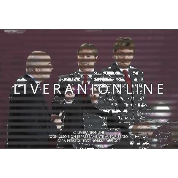 Polish former football star Andrzej Szarmach (C) draws Norway next UEFA general secretary Gianni Infantino (L) and Polish former football star Zbigniew Boniek durnig the UEFA EURO 2012 qualifying Draw Cremony in the Congress Hall of the Palace of Culture and Science in Warsaw, Poland, 7 February 2010. 51 teams taking part in the Euro 2012 qualifications will create nine groups. Six of them will consist of six teams, and three of them – five. Winners and one team from the second place with the best achievements will advance to championships directly. The other eight teams classified on the second position in the group will set up four pairs. The EURO 2012 European soccer championship will kick off June 2012 in Poland and Ukraine. The opening match at the National Stadium in Warsaw will take place on 8 June. Eliminations will begin in September 2010 and will last until autumn 2011. /Agenzia Aldo Liverani Sas - ITALY ONLY - VARSAVIA: SORTEGGI DI QUALIFICAZIONE AGLI EUROPEI DI CALCIO UCRAINA-POLONIA 2012