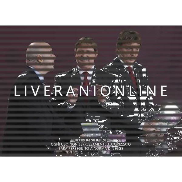 Polish former football star Andrzej Szarmach (C) draws Israel next UEFA general secretary Gianni Infantino (L) and Polish former football star Zbigniew Boniek durnig the UEFA EURO 2012 qualifying Draw Cremony in the Congress Hall of the Palace of Culture and Science in Warsaw, Poland, 7 February 2010. 51 teams taking part in the Euro 2012 qualifications will create nine groups. Six of them will consist of six teams, and three of them – five. Winners and one team from the second place with the best achievements will advance to championships directly. The other eight teams classified on the second position in the group will set up four pairs. The EURO 2012 European soccer championship will kick off June 2012 in Poland and Ukraine. The opening match at the National Stadium in Warsaw will take place on 8 June. Eliminations will begin in September 2010 and will last until autumn 2011. /Agenzia Aldo Liverani Sas - ITALY ONLY - VARSAVIA: SORTEGGI DI QUALIFICAZIONE AGLI EUROPEI DI CALCIO UCRAINA-POLONIA 2012