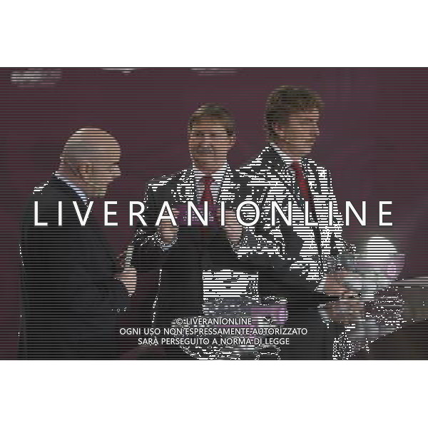 Polish former football star Andrzej Szarmach (C) draws Republic of Ireland next UEFA general secretary Gianni Infantino (L) and Polish former football star Zbigniew Boniek durnig the UEFA EURO 2012 qualifying Draw Cremony in the Congress Hall of the Palace of Culture and Science in Warsaw, Poland, 7 February 2010. 51 teams taking part in the Euro 2012 qualifications will create nine groups. Six of them will consist of six teams, and three of them – five. Winners and one team from the second place with the best achievements will advance to championships directly. The other eight teams classified on the second position in the group will set up four pairs. The EURO 2012 European soccer championship will kick off June 2012 in Poland and Ukraine. The opening match at the National Stadium in Warsaw will take place on 8 June. Eliminations will begin in September 2010 and will last until autumn 2011. /Agenzia Aldo Liverani Sas - ITALY ONLY - VARSAVIA: SORTEGGI DI QUALIFICAZIONE AGLI EUROPEI DI CALCIO UCRAINA-POLONIA 2012