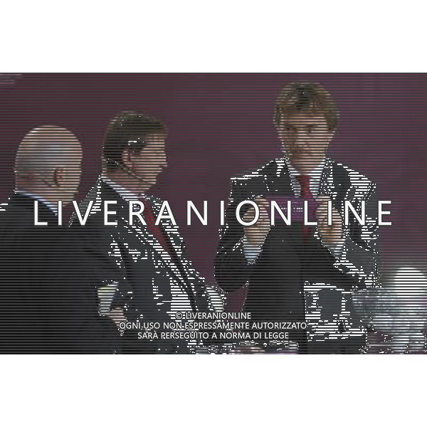 Polish former football star Zbigniew Boniek (R) draws Austria next UEFA general secretary Gianni Infantino (L) and Polish former football star Andrzej Szarmach (C) durnig the UEFA EURO 2012 qualifying Draw Cremony in the Congress Hall of the Palace of Culture and Science in Warsaw, Poland, 7 February 2010. 51 teams taking part in the Euro 2012 qualifications will create nine groups. Six of them will consist of six teams, and three of them – five. Winners and one team from the second place with the best achievements will advance to championships directly. The other eight teams classified on the second position in the group will set up four pairs. The EURO 2012 European soccer championship will kick off June 2012 in Poland and Ukraine. The opening match at the National Stadium in Warsaw will take place on 8 June. Eliminations will begin in September 2010 and will last until autumn 2011. /Agenzia Aldo Liverani Sas - ITALY ONLY - VARSAVIA: SORTEGGI DI QUALIFICAZIONE AGLI EUROPEI DI CALCIO UCRAINA-POLONIA 2012