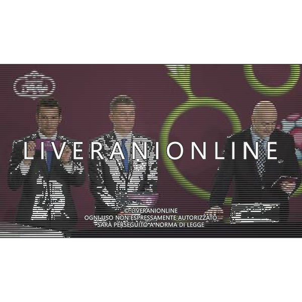 Ukrainian football star Andriy Shevchenko (L) draw Belgium next the former Ukrainian soccer player Oleg Blokhin (C) with UEFA general secretary Gianni Infantino (R) durnig the UEFA EURO 2012 qualifying Draw Cremony in the Congress Hall of the Palace of Culture and Science in Warsaw, Poland, 7 February 2010. 51 teams taking part in the Euro 2012 qualifications will create nine groups. Six of them will consist of six teams, and three of them – five. Winners and one team from the second place with the best achievements will advance to championships directly. The other eight teams classified on the second position in the group will set up four pairs. The EURO 2012 European soccer championship will kick off June 2012 in Poland and Ukraine. The opening match at the National Stadium in Warsaw will take place on 8 June. Eliminations will begin in September 2010 and will last until autumn 2011. /Agenzia Aldo Liverani Sas - ITALY ONLY - VARSAVIA: SORTEGGI DI QUALIFICAZIONE AGLI EUROPEI DI CALCIO UCRAINA-POLONIA 2012