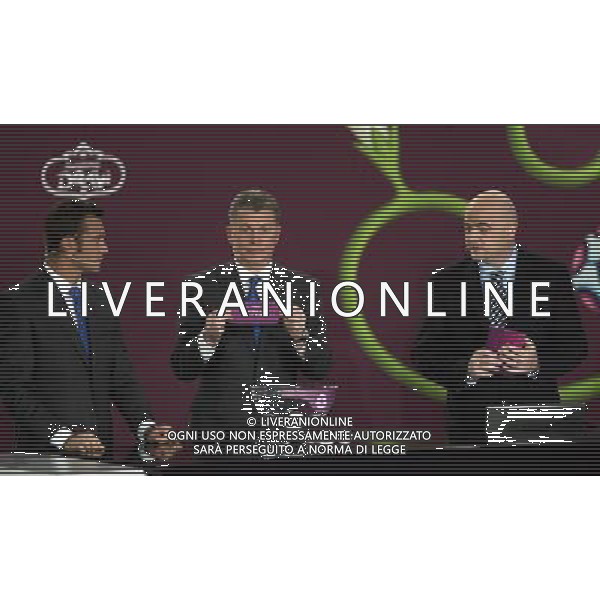 Ukrainian former football star Oleg Blokhin (C) draws Cyprus next the Ukrainian soccer player Andriy Shevchenko (L) with UEFA general secretary Gianni Infantino (R) durnig the UEFA EURO 2012 qualifying Draw Cremony in the Congress Hall of the Palace of Culture and Science in Warsaw, Poland, 7 February 2010. 51 teams taking part in the Euro 2012 qualifications will create nine groups. Six of them will consist of six teams, and three of them – five. Winners and one team from the second place with the best achievements will advance to championships directly. The other eight teams classified on the second position in the group will set up four pairs. The EURO 2012 European soccer championship will kick off June 2012 in Poland and Ukraine. The opening match at the National Stadium in Warsaw will take place on 8 June. Eliminations will begin in September 2010 and will last until autumn 2011. /Agenzia Aldo Liverani Sas - ITALY ONLY - VARSAVIA: SORTEGGI DI QUALIFICAZIONE AGLI EUROPEI DI CALCIO UCRAINA-POLONIA 2012