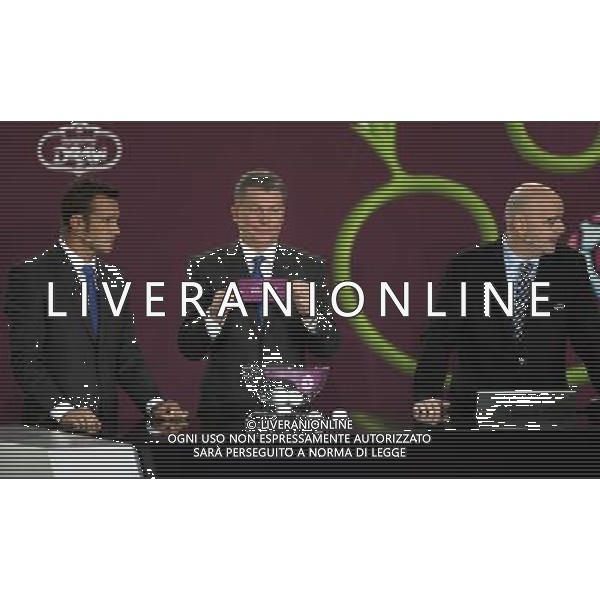 Ukrainian former football star Oleg Blokhin (C) draws Belarus next the Ukrainian soccer player Andriy Shevchenko (L) with UEFA general secretary Gianni Infantino (R) durnig the UEFA EURO 2012 qualifying Draw Cremony in the Congress Hall of the Palace of Culture and Science in Warsaw, Poland, 7 February 2010. 51 teams taking part in the Euro 2012 qualifications will create nine groups. Six of them will consist of six teams, and three of them – five. Winners and one team from the second place with the best achievements will advance to championships directly. The other eight teams classified on the second position in the group will set up four pairs. The EURO 2012 European soccer championship will kick off June 2012 in Poland and Ukraine. The opening match at the National Stadium in Warsaw will take place on 8 June. Eliminations will begin in September 2010 and will last until autumn 2011. /Agenzia Aldo Liverani Sas - ITALY ONLY - VARSAVIA: SORTEGGI DI QUALIFICAZIONE AGLI EUROPEI DI CALCIO UCRAINA-POLONIA 2012