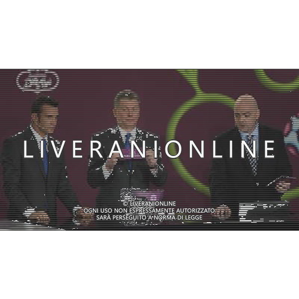 Ukrainian former football star Oleg Blokhin (C) draws Macedonia next the Ukrainian soccer player Andriy Shevchenko (L) with UEFA general secretary Gianni Infantino (R) durnig the UEFA EURO 2012 qualifying Draw Cremony in the Congress Hall of the Palace of Culture and Science in Warsaw, Poland, 7 February 2010. 51 teams taking part in the Euro 2012 qualifications will create nine groups. Six of them will consist of six teams, and three of them – five. Winners and one team from the second place with the best achievements will advance to championships directly. The other eight teams classified on the second position in the group will set up four pairs. The EURO 2012 European soccer championship will kick off June 2012 in Poland and Ukraine. The opening match at the National Stadium in Warsaw will take place on 8 June. Eliminations will begin in September 2010 and will last until autumn 2011. /Agenzia Aldo Liverani Sas - ITALY ONLY - VARSAVIA: SORTEGGI DI QUALIFICAZIONE AGLI EUROPEI DI CALCIO UCRAINA-POLONIA 2012