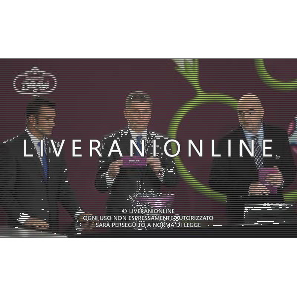 Ukrainian former football star Oleg Bloghin (C) draws Malta next the Ukrainian soccer player Andriy Shevchenko (L) with UEFA general secretary Gianni Infantino (R) durnig the UEFA EURO 2012 qualifying Draw Cremony in the Congress Hall of the Palace of Culture and Science in Warsaw, Poland, 7 February 2010. 51 teams taking part in the Euro 2012 qualifications will create nine groups. Six of them will consist of six teams, and three of them – five. Winners and one team from the second place with the best achievements will advance to championships directly. The other eight teams classified on the second position in the group will set up four pairs. The EURO 2012 European soccer championship will kick off June 2012 in Poland and Ukraine. The opening match at the National Stadium in Warsaw will take place on 8 June. Eliminations will begin in September 2010 and will last until autumn 2011. /Agenzia Aldo Liverani Sas - ITALY ONLY - VARSAVIA: SORTEGGI DI QUALIFICAZIONE AGLI EUROPEI DI CALCIO UCRAINA-POLONIA 2012