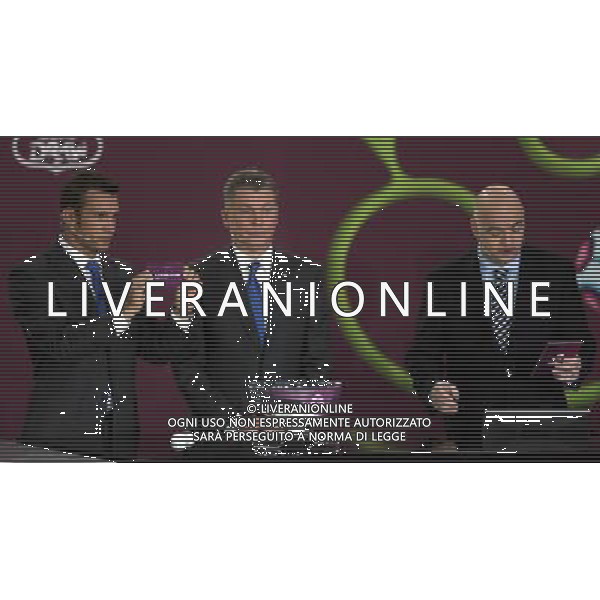 Ukrainian football star Andriy Shevchenko (L) draw Azerbaijan next the former Ukrainian soccer player Oleg Blokhin (C) with UEFA general secretary Gianni Infantino (R) durnig the UEFA EURO 2012 qualifying Draw Cremony in the Congress Hall of the Palace of Culture and Science in Warsaw, Poland, 7 February 2010. 51 teams taking part in the Euro 2012 qualifications will create nine groups. Six of them will consist of six teams, and three of them – five. Winners and one team from the second place with the best achievements will advance to championships directly. The other eight teams classified on the second position in the group will set up four pairs. The EURO 2012 European soccer championship will kick off June 2012 in Poland and Ukraine. The opening match at the National Stadium in Warsaw will take place on 8 June. Eliminations will begin in September 2010 and will last until autumn 2011. /Agenzia Aldo Liverani Sas - ITALY ONLY - VARSAVIA: SORTEGGI DI QUALIFICAZIONE AGLI EUROPEI DI CALCIO UCRAINA-POLONIA 2012