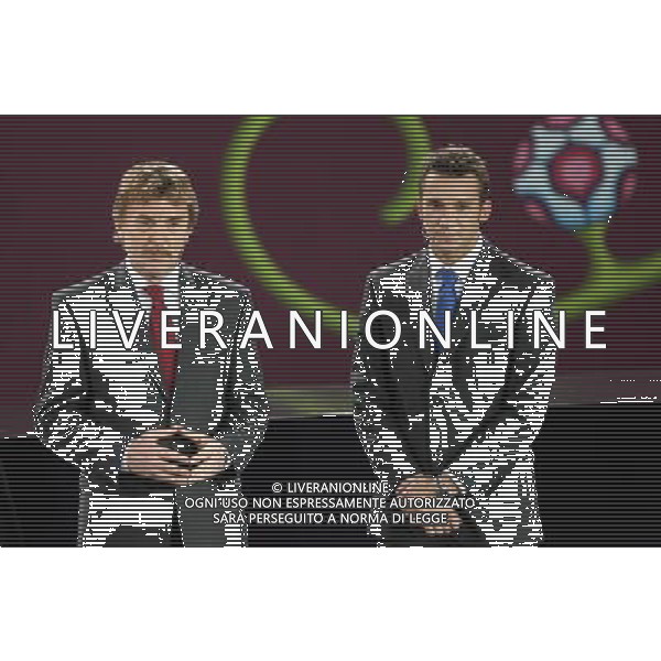 Former Polish soccer player Zbigniew Boniek (L) and Ukrainian frormer football star Andriy Shevchenko (R) the UEFA EURO 2012 qualifying Draw Cremony in the Congress Hall of the Palace of Culture and Science in Warsaw, Poland, 7 February 2010. 51 teams taking part in the Euro 2012 qualifications will create nine groups. Six of them will consist of six teams, and three of them – five. Winners and one team from the second place with the best achievements will advance to championships directly. The other eight teams classified on the second position in the group will set up four pairs. The EURO 2012 European soccer championship will kick off June 2012 in Poland and Ukraine. The opening match at the National Stadium in Warsaw will take place on 8 June. Eliminations will begin in September 2010 and will last until autumn 2011. /Agenzia Aldo Liverani Sas - ITALY ONLY - VARSAVIA: SORTEGGI DI QUALIFICAZIONE AGLI EUROPEI DI CALCIO UCRAINA-POLONIA 2012