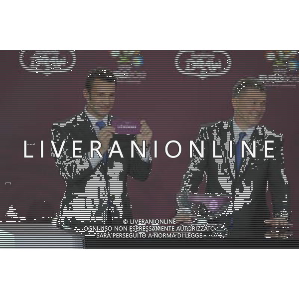 Ukrainian football star Andriy Shevchenko (L) draws Lithuania next the former Ukrainian soccer player Oleg Blokhin durnig the UEFA EURO 2012 qualifying Draw Cremony in the Congress Hall of the Palace of Culture and Science in Warsaw, Poland, 7 February 2010. /Agenzia Aldo Liverani Sas - ITALY ONLY - VARSAVIA: SORTEGGI DI QUALIFICAZIONE AGLI EUROPEI DI CALCIO UCRAINA-POLONIA 2012