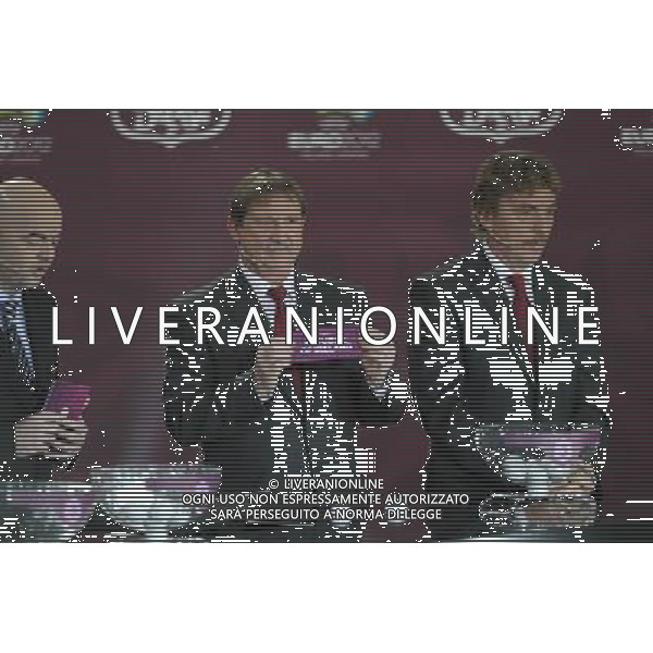 Polish former football star Andrzej Szarmach (C) draws Republic of Ireland next Polish former football star Zbigniew Boniek (R) durnig the UEFA EURO 2012 qualifying Draw Cremony in the Congress Hall of the Palace of Culture and Science in Warsaw, Poland, 7 February 2010. /Agenzia Aldo Liverani Sas - ITALY ONLY - VARSAVIA: SORTEGGI DI QUALIFICAZIONE AGLI EUROPEI DI CALCIO UCRAINA-POLONIA 2012