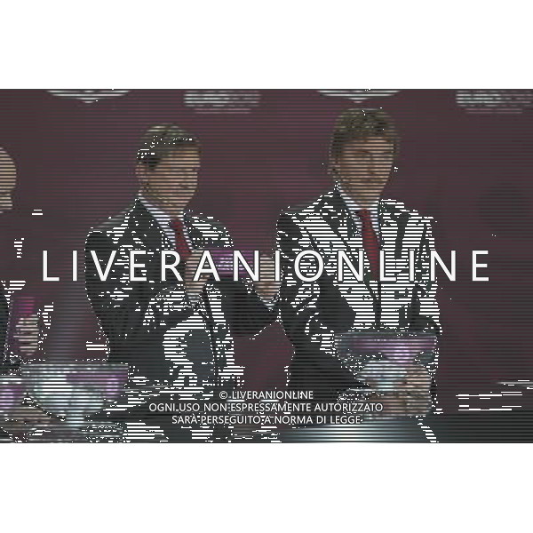 Polish former football star Andrzej Szarmach (C) draws Bosnia-Herzegovina next Polish former football star Zbigniew Boniek (R) durnig the UEFA EURO 2012 qualifying Draw Cremony in the Congress Hall of the Palace of Culture and Science in Warsaw, Poland, 7 February 2010. /Agenzia Aldo Liverani Sas - ITALY ONLY - VARSAVIA: SORTEGGI DI QUALIFICAZIONE AGLI EUROPEI DI CALCIO UCRAINA-POLONIA 2012