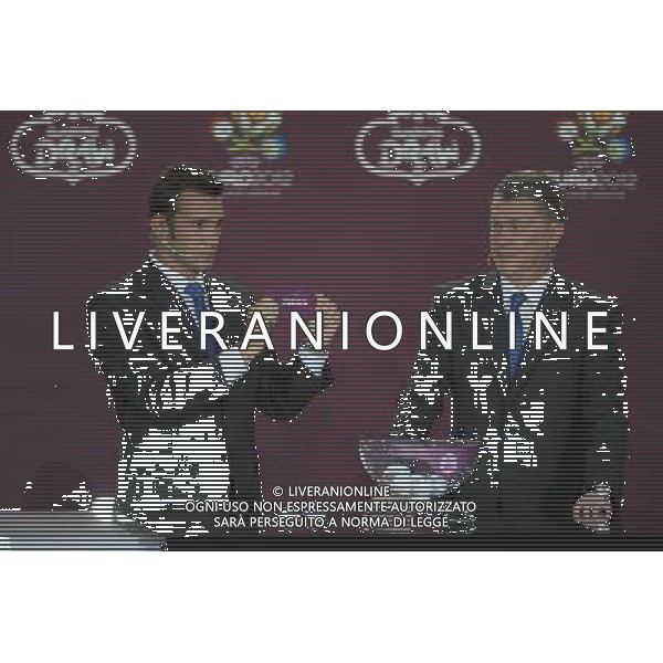 Ukrainian football star Andriy Shevchenko (L) draws Sweden next the former Ukrainian soccer player Oleg Blokhin durnig the UEFA EURO 2012 qualifying Draw Cremony in the Congress Hall of the Palace of Culture and Science in Warsaw, Poland, 7 February 2010. /Agenzia Aldo Liverani Sas - ITALY ONLY - VARSAVIA: SORTEGGI DI QUALIFICAZIONE AGLI EUROPEI DI CALCIO UCRAINA-POLONIA 2012