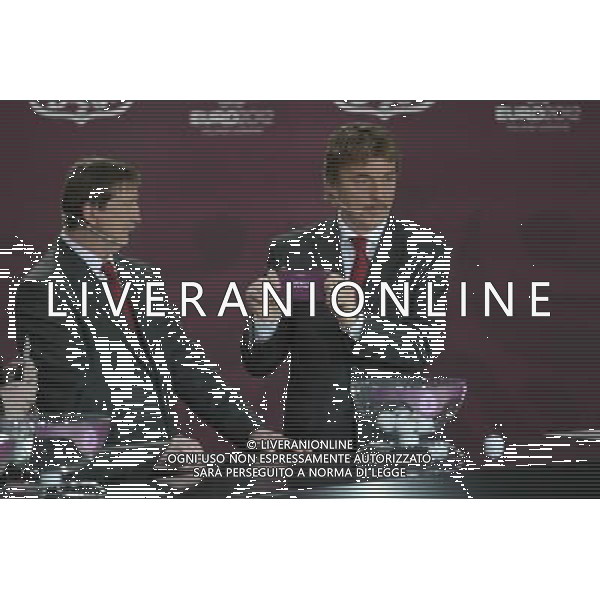 Polish former football star Zbigniew Boniek (R) draws Italy next Polish former football star Andrzej Szarmach (L) durnig the UEFA EURO 2012 qualifying Draw Cremony in the Congress Hall of the Palace of Culture and Science in Warsaw, Poland, 7 February 2010. /Agenzia Aldo Liverani Sas - ITALY ONLY - VARSAVIA: SORTEGGI DI QUALIFICAZIONE AGLI EUROPEI DI CALCIO UCRAINA-POLONIA 2012