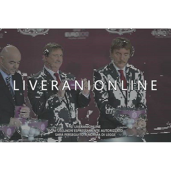 Polish former football star Andrzej Szarmach (C) draws Israel next Polish former football star Zbigniew Boniek (R) and UEFA general secretary Gianni Infantino (L) durnig the UEFA EURO 2012 qualifying Draw Cremony in the Congress Hall of the Palace of Culture and Science in Warsaw, Poland, 7 February 2010. /Agenzia Aldo Liverani Sas - ITALY ONLY - VARSAVIA: SORTEGGI DI QUALIFICAZIONE AGLI EUROPEI DI CALCIO UCRAINA-POLONIA 2012