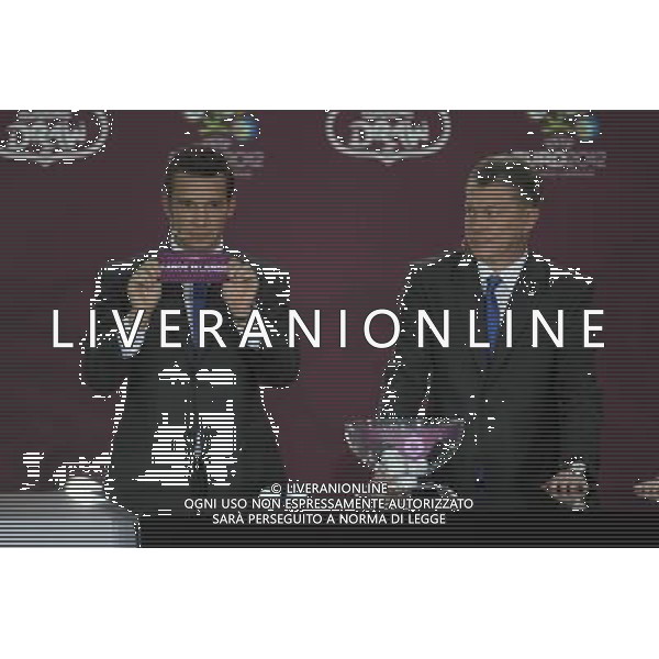 Ukrainian football star Andriy Shevchenko (L) draws Faroe Island next the former Ukrainian soccer player Oleg Blokhin durnig the UEFA EURO 2012 qualifying Draw Cremony in the Congress Hall of the Palace of Culture and Science in Warsaw, Poland, 7 February 2010. /Agenzia Aldo Liverani Sas - ITALY ONLY - VARSAVIA: SORTEGGI DI QUALIFICAZIONE AGLI EUROPEI DI CALCIO UCRAINA-POLONIA 2012