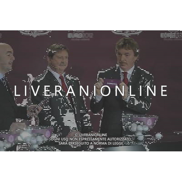 Polish former football star Zbigniew Boniek(R) draws Armenia next Polish former football star Andrzej Szarmach (L) durnig the UEFA EURO 2012 qualifying Draw Cremony in the Congress Hall of the Palace of Culture and Science in Warsaw, Poland, 7 February 2010. /Agenzia Aldo Liverani Sas - ITALY ONLY - VARSAVIA: SORTEGGI DI QUALIFICAZIONE AGLI EUROPEI DI CALCIO UCRAINA-POLONIA 2012