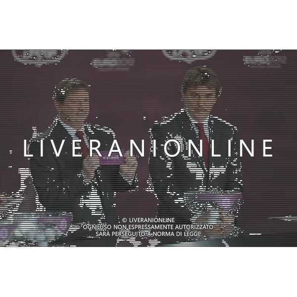 Polish former football star Andrzej Szarmach (C) draws Iceland next Polish former football star Zbigniew Boniek (R) durnig the UEFA EURO 2012 qualifying Draw Cremony in the Congress Hall of the Palace of Culture and Science in Warsaw, Poland, 7 February 2010. /Agenzia Aldo Liverani Sas - ITALY ONLY - VARSAVIA: SORTEGGI DI QUALIFICAZIONE AGLI EUROPEI DI CALCIO UCRAINA-POLONIA 2012