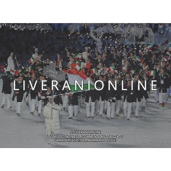 (100212) -- VANCOUVER, Feb. 12, 2010 -- Members of the Italian delegation parade into the stadium during the opening ceremony for the 2010 Winter Olympic Games inside the BC Place stadium in Vancouver, Canada, on Feb. 12, 2010. Shen Hong) (hy) /Agenzia Aldo Liverani Sas - ITALY ONLY - CERIMONIA D\'APERTURA DEI XXI GIOCHI OLIMPICI INVERNALI OLIMPIADI DI VANCOUVER 2010 - CANADA
