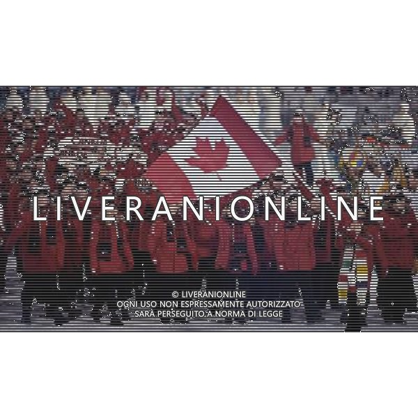 (100212) -- VANCOUVER, Feb. 12, 2010 -- Members of the Canadian delegation parade into the stadium during the opening ceremony for the 2010 Winter Olympic Games inside the BC Place stadium in Vancouver, Canada, on Feb. 12, 2010. Qi Heng) (hy) /Agenzia Aldo Liverani Sas - ITALY ONLY - CERIMONIA D\'APERTURA DEI XXI GIOCHI OLIMPICI INVERNALI OLIMPIADI DI VANCOUVER 2010 - CANADA