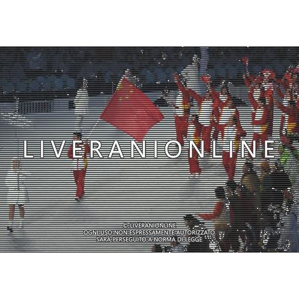 (100212) -- VANCOUVER, Feb. 12, 2010 -- Members of the Chinese delegation parade into the stadium during the opening ceremony for the 2010 Winter Olympic Games at the BC Place stadium in Vancouver, Canada on Feb. 12, 2010. Yang Lei) (hy) /Agenzia Aldo Liverani Sas - ITALY ONLY - CERIMONIA D\'APERTURA DEI XXI GIOCHI OLIMPICI INVERNALI OLIMPIADI DI VANCOUVER 2010 - CANADA