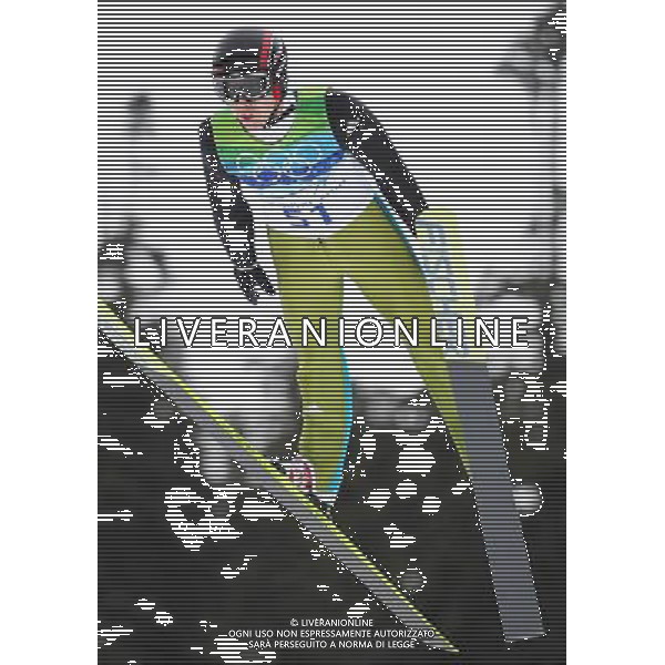 (100213) -- WHISTLER, Feb. 13, 2010 -- Switzerland\'s Simon Ammann competes for men\'s NH individual final of ski jumping at the 2010 Winter Olympic Games in Whistler, Canada, Feb. 13, 2010. Simon Ammann claimed the very first gold medal of Vancouver winter games with 276.5 points. Xu Jiajun) /Agenzia Aldo Liverani Sas - ITALY ONLY - 21mi GIOCHI OLIMPICI INVERNALI OLIMPIADI DI VANCOUVER 2010 (CANADA)